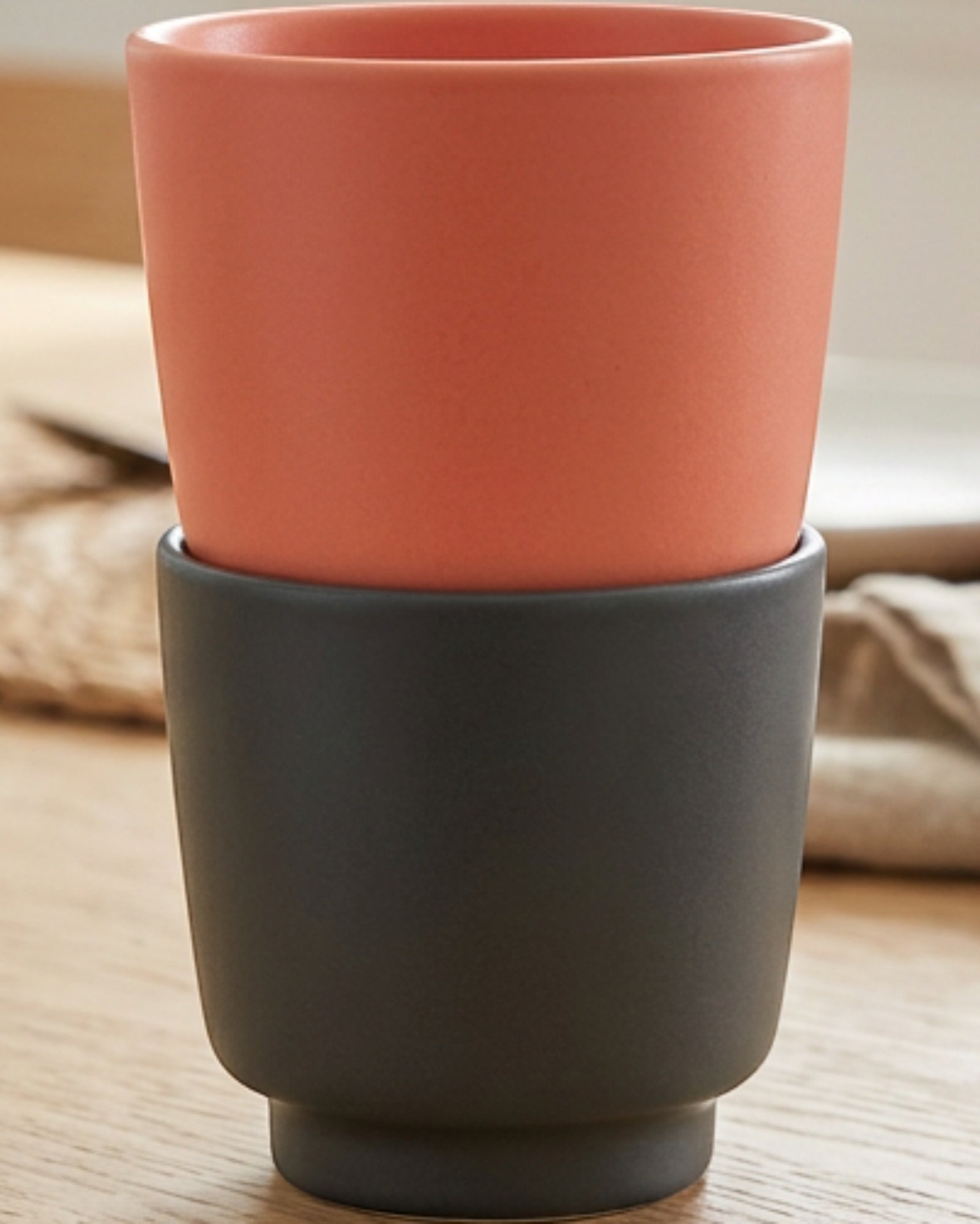 Modha Stackable Ceramic Cups Set of 2 300 ml Coral and Graphite - Lifestyle view